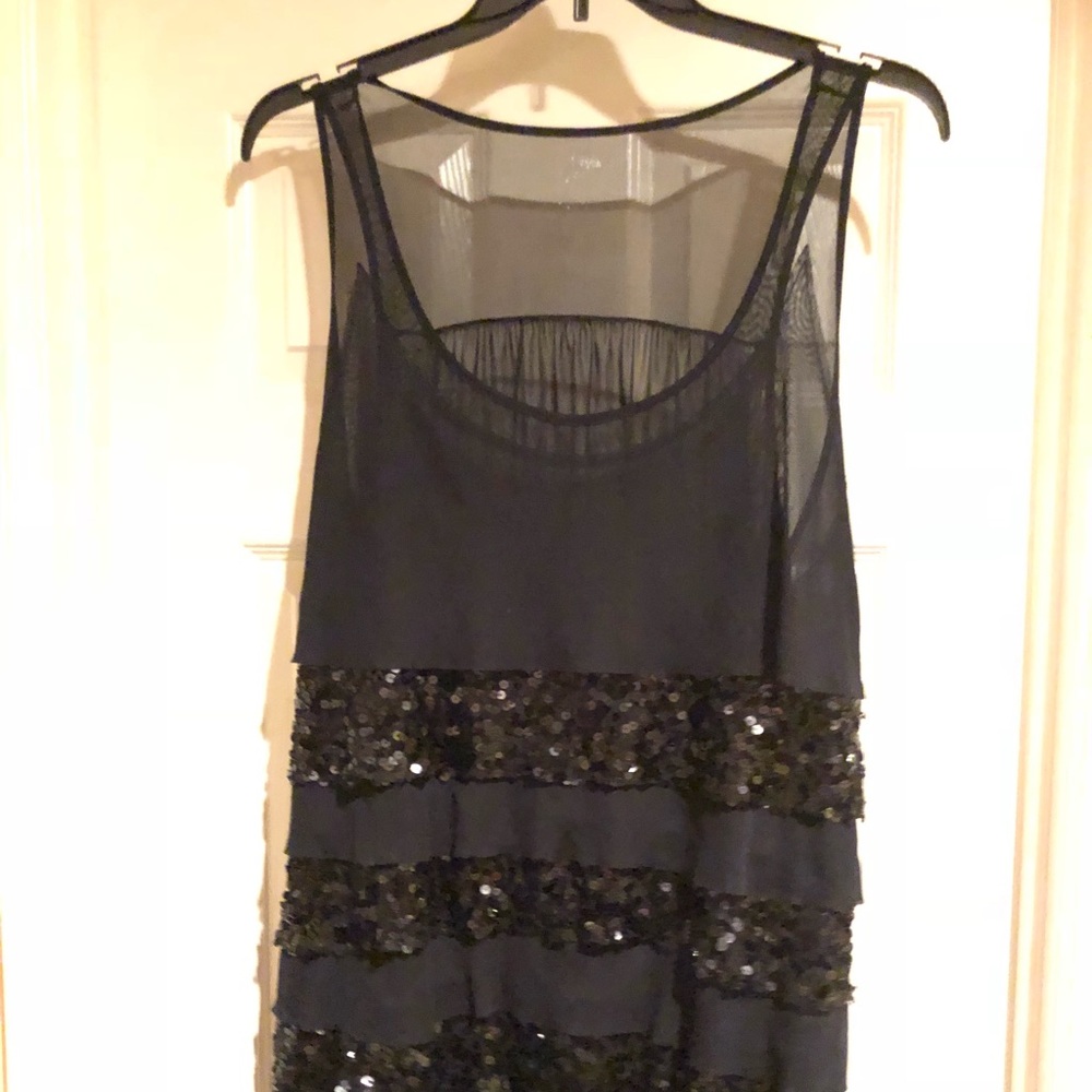 Sequence ruffled dressy tank top.
